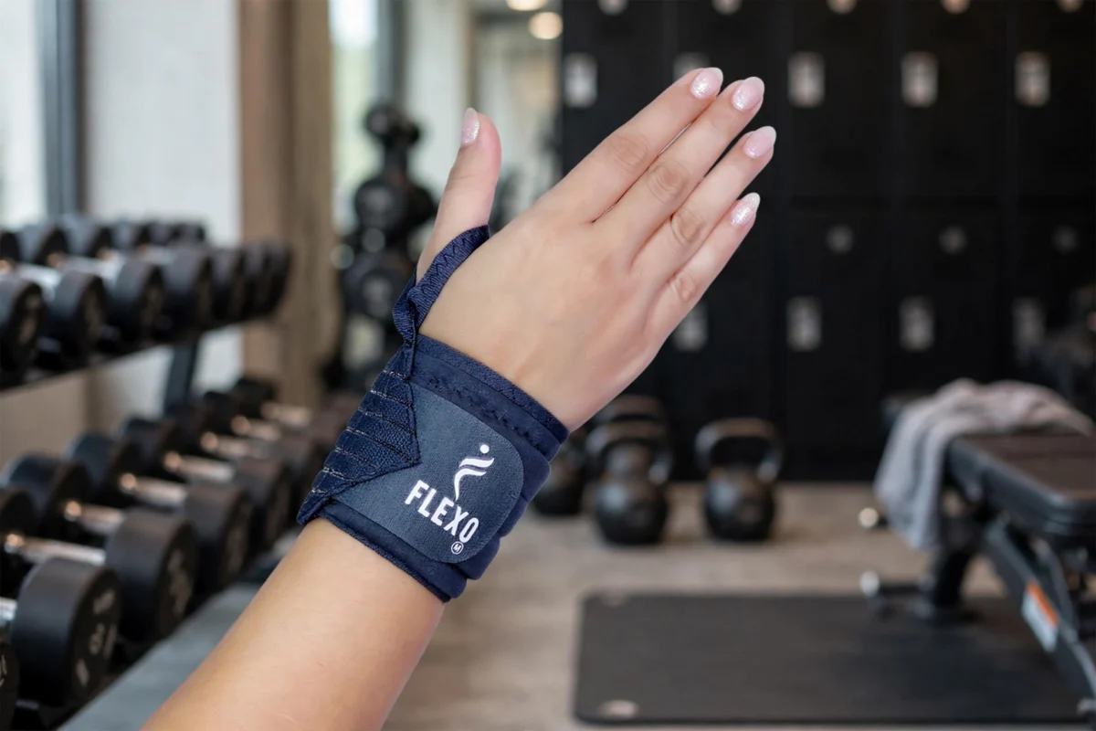 Flexo Wrist Wrap with Thumb worn on wrist during gym workout for joint stabilization